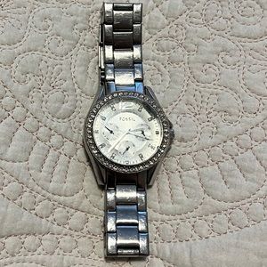 Women’s silver Fossil watch